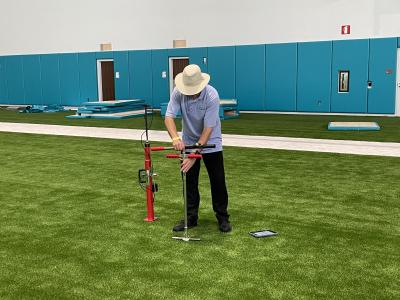 Insert the Turf-Tec Synthetic Turf Shear Strength Tester into the Synthetic Turf and then attach the 0-9 nm torque wrench